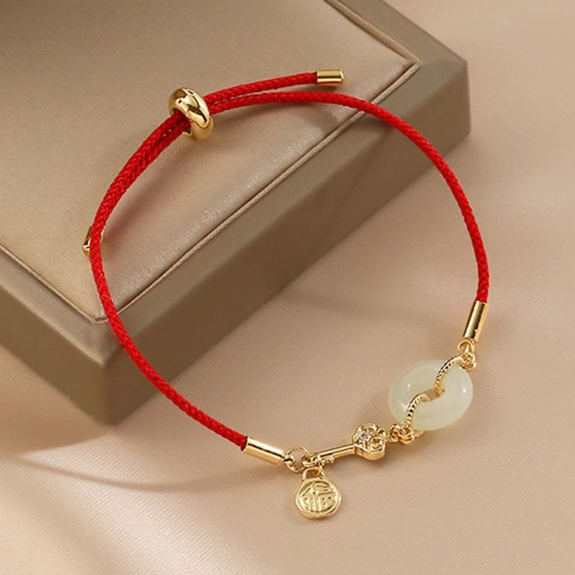 Premium Hetian jade bracelet showcasing natural color variations and authentic stone characteristics