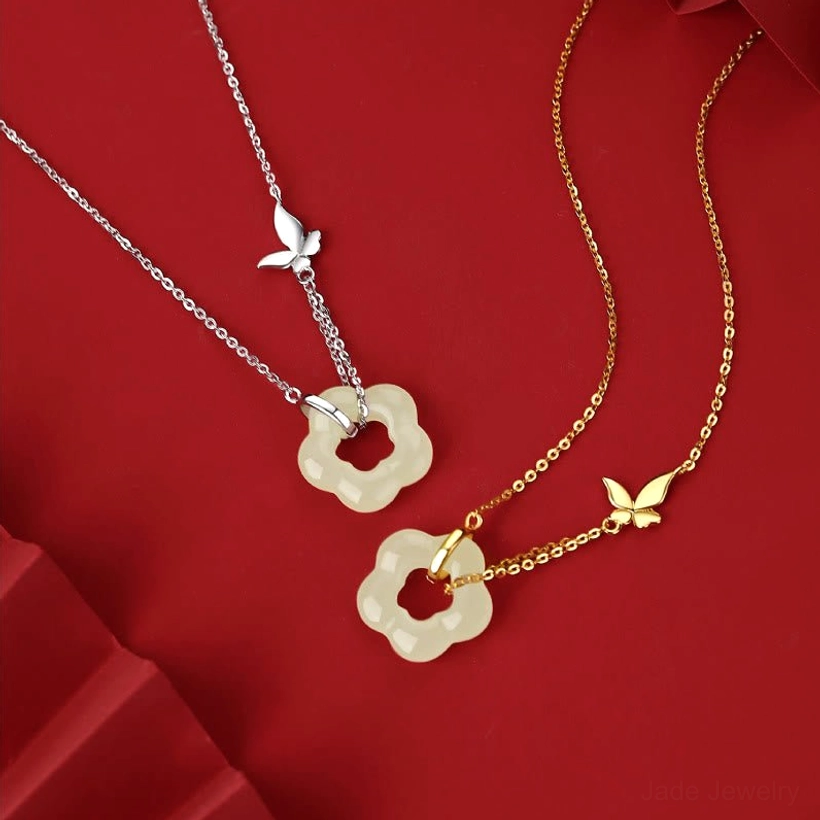 Hetian jade butterfly flower sterling silver necklace detail shot showing delicate pendant craftsmanship