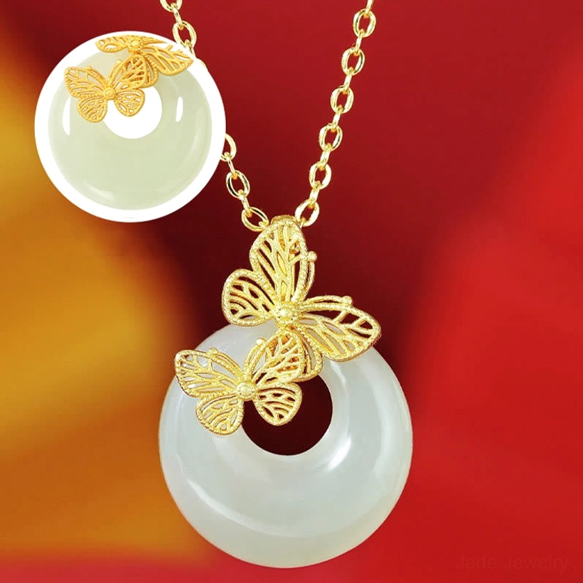 Hetian jade butterfly necklace full view with magnified close-up insert showing the pale green jade stone and delicate butterfly filigree work