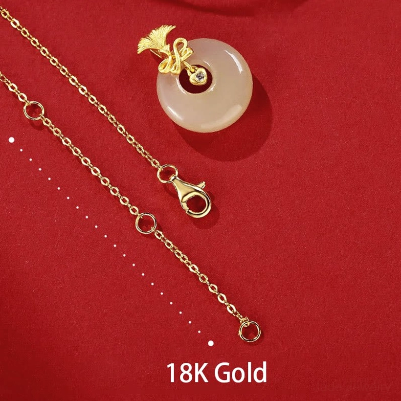 Complete hetian jade carnation jewelry set with 18k gold-plated finish and extendable chain on red background