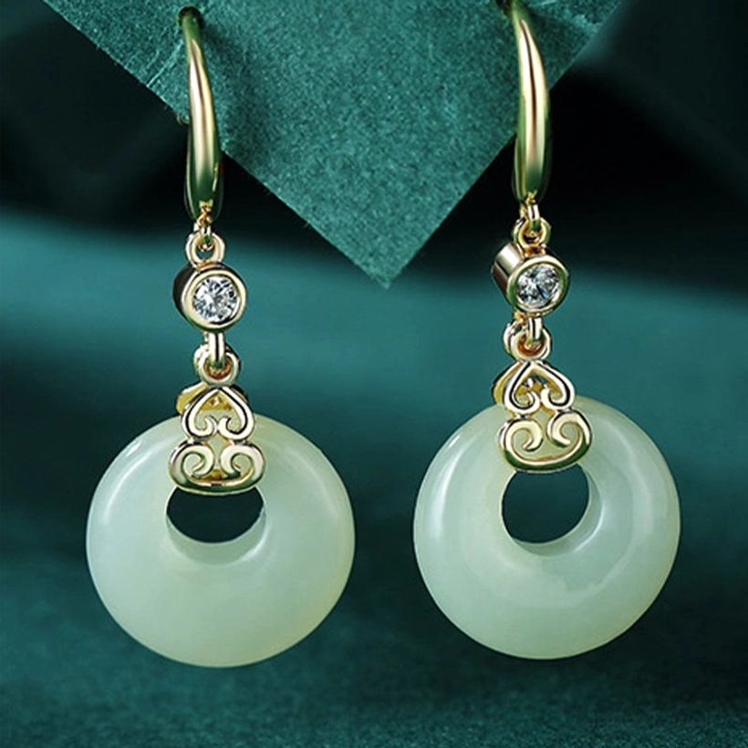Hetian jade peace buckle earrings showcasing natural jade stone with sterling silver settings and zircon sparkle