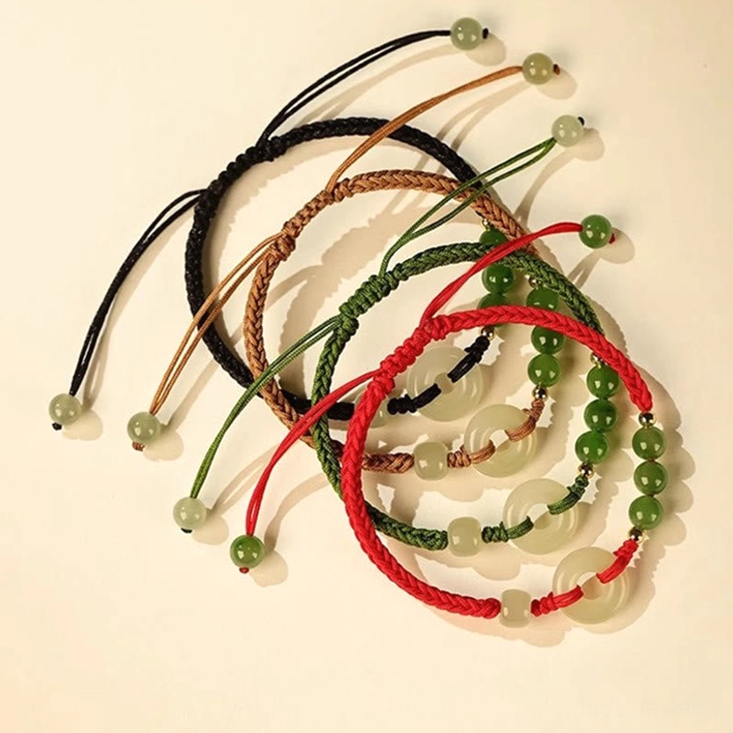 Hetian jade peace buckle bracelet detail shot showing jade quality, rope craftsmanship and bead construction