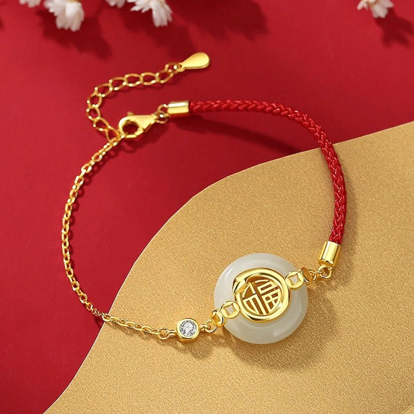 Adjustable Hetian jade peace buckle bracelet with Fu mark, red string, and gold-mounted extender chain