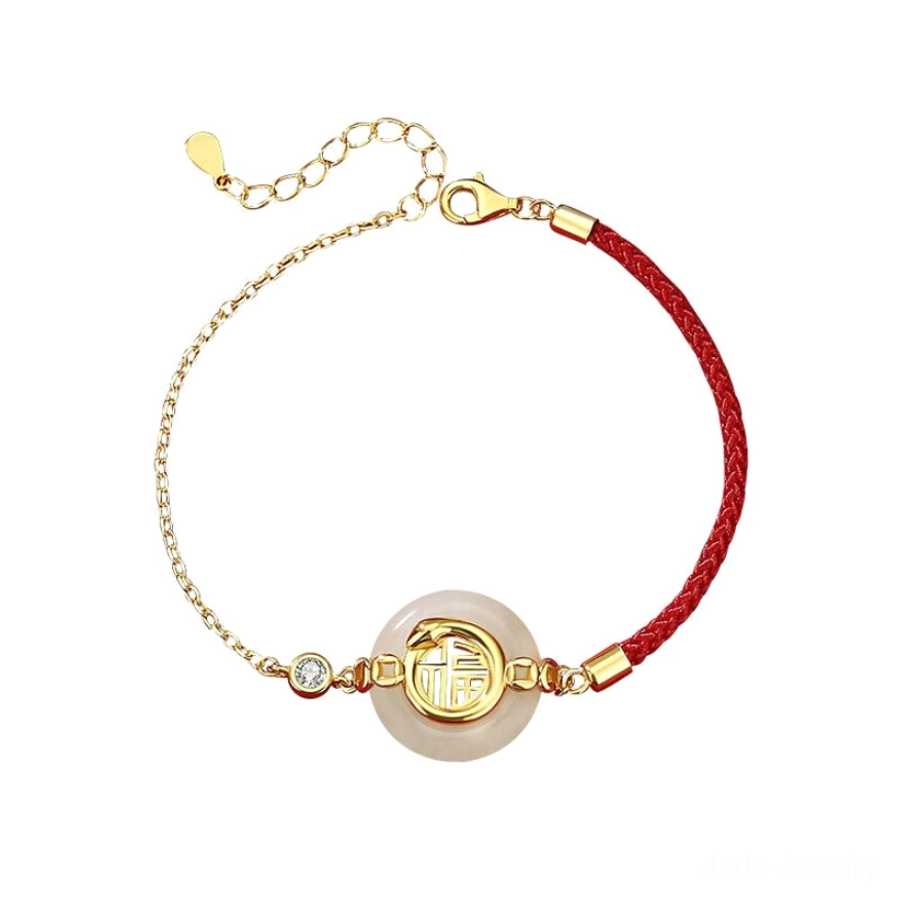Full view of Hetian jade peace buckle Fu character bracelet with red cord and silver chain on white background