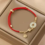Hetian jade peace buckle red string bracelet with Fu character pendant and 18K gold plating in luxury gift box