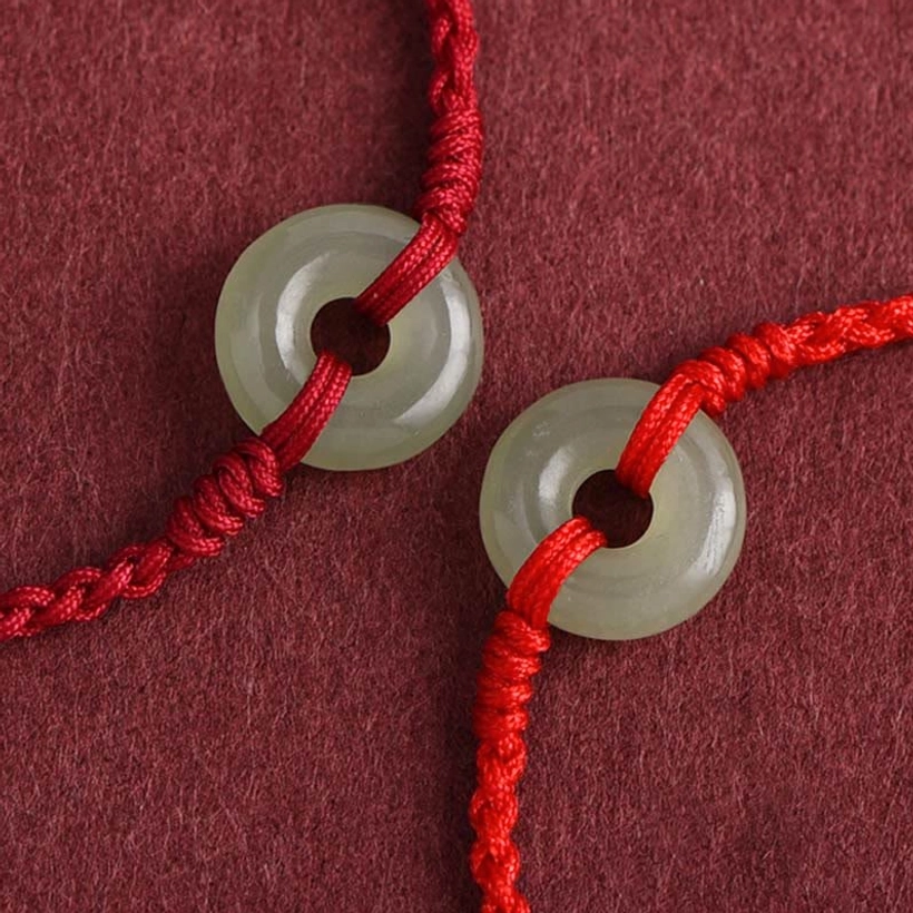 Loose Hetian jade peace buckles and red braided rope cord segments