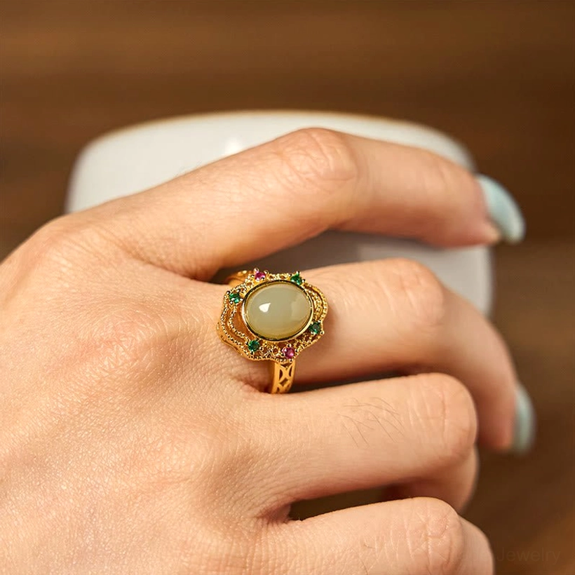Jade ring worn on hand showing authentic vintage aesthetic, close-up perspective demonstrating comfortable fit and natural jade coloring