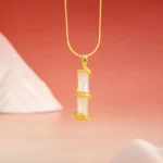 Hetian jade snake bamboo pendant with 925 sterling silver - front close-up showing coiled snake design and green gem accent on white jade