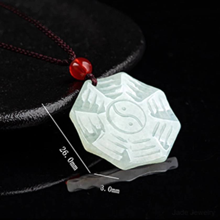 Jade Bagua Yin Yang pendant with dimensions marked 26mm x 3mm showing precise carved bagua trigrams and tai chi detail