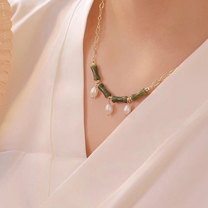Tianshan jade bamboo pearl necklace detail shot of pendant design and craftsmanship