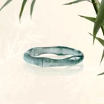 Natural jade bamboo ring with carved bamboo joint design - front view showing deep teal green jade with natural veining