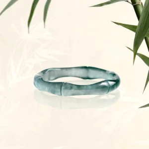 Natural jade bamboo ring with carved bamboo joint design - front view showing deep teal green jade with natural veining