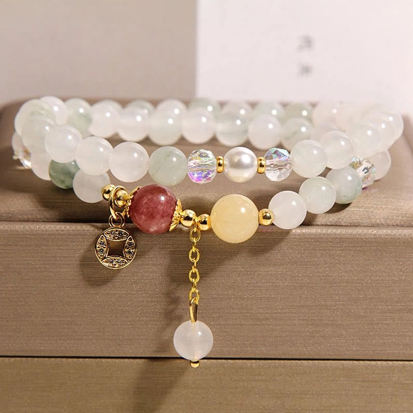 Light jade beaded double wrap bracelet with copper coin charm and hanging white gemstone bead