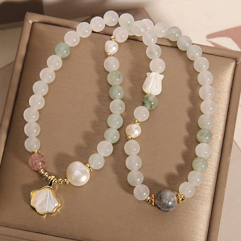 Two separate jade beaded bracelets with white stones mixed gems and shell pendant with gold hardware