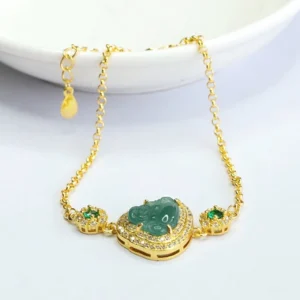 Side overhead view of jade Buddha bracelet showing adjustable gold-plated chain with CZ paved accent stones
