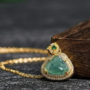 Laughing Buddha jade necklace pendant side angle showing detailed carving and gold setting