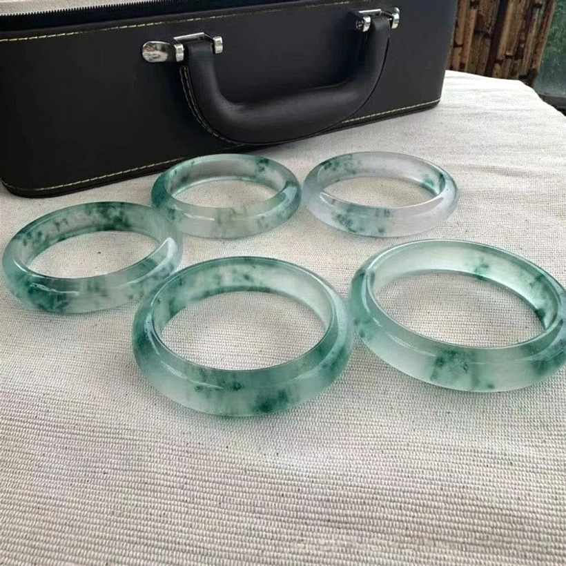 Natural jade floating flower bangle bracelet for prosperity and protection, complete product view