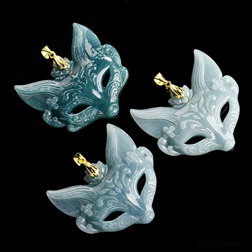 Fox mask jade pendant with titanium steel chain, showing natural jade coloring and refined craftsmanship in detailed view