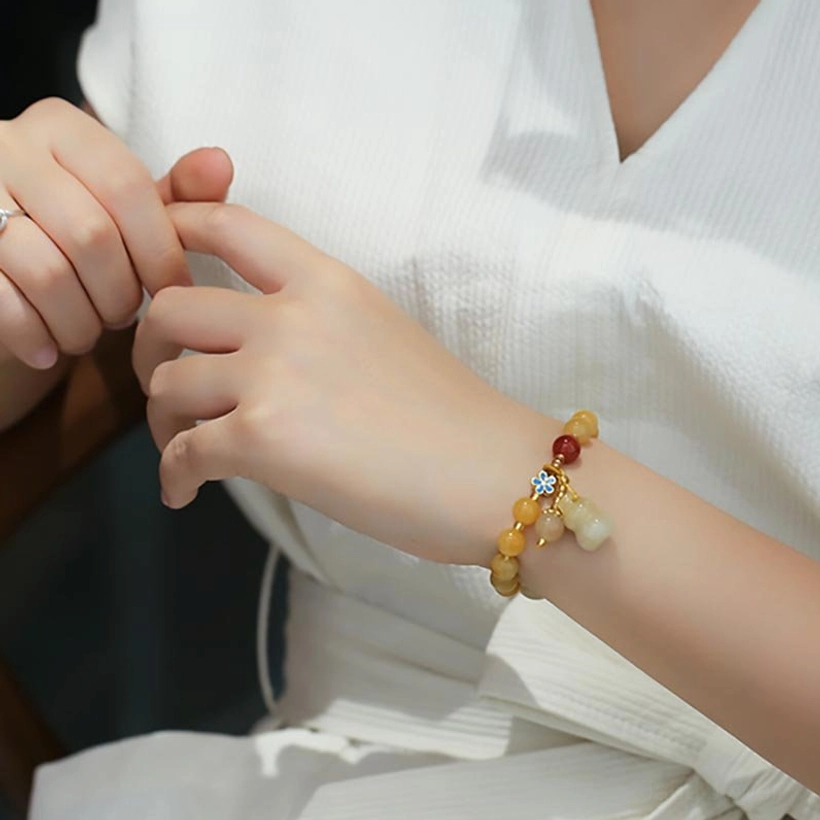 Golden Jade Gourd Wealth Bracelet Wrist Wear - Left Side View with Pendant Visibility