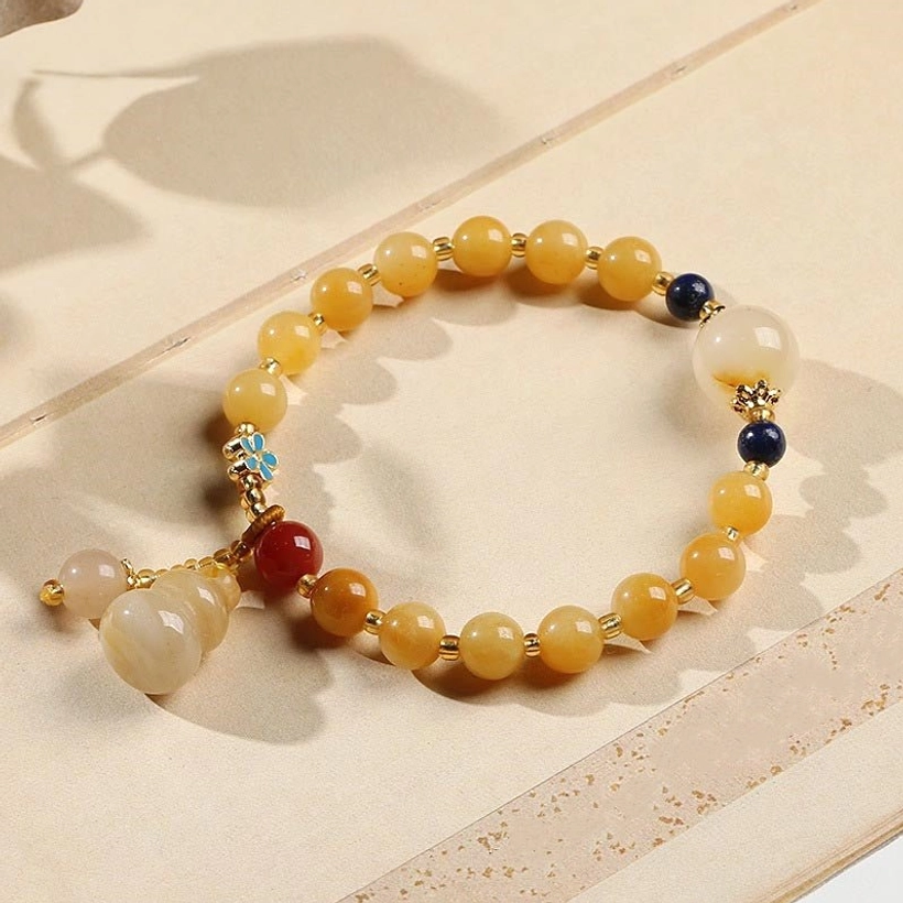 Natural Golden Silk Jade Beaded Bracelet with Gourd Pendants and Spacer Beads - Product Overview