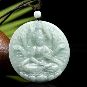 Carved thousand-hand Guanyin jade pendant shown from angled perspective with natural pottery styling