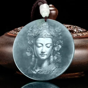 Avalokitesvara jade necklace side angle with braided black cord and jade bead accent on wooden base
