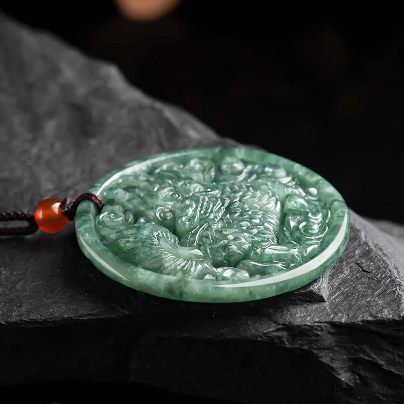 Side profile view of hand-carved jade kirin pendant necklace showing smooth polished edge
