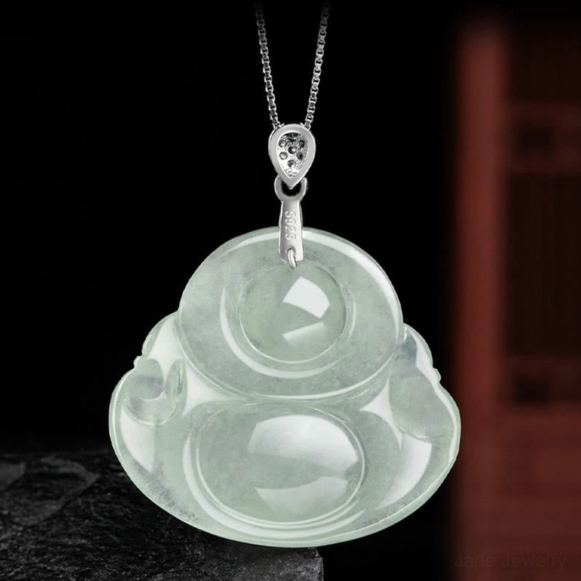 Reverse back side of jade laughing Buddha pendant showing smooth carved surface and chain attachment point