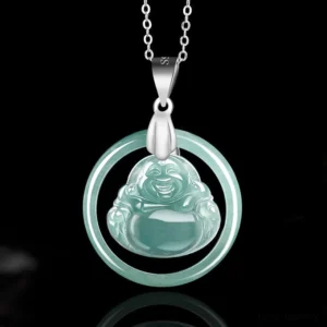 Laughing Buddha jade pendant necklace frontal view on black background, showing teal translucent jade with silver circular frame