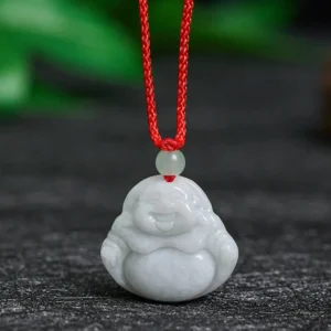 Natural grey jade Laughing Buddha pendant necklace with red cord, front view showing carved smiling Buddha face