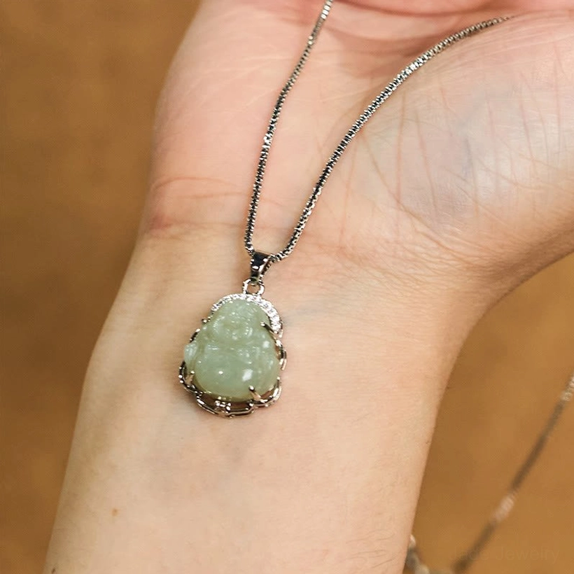 Hetian jade Laughing Buddha necklace worn on wrist, demonstrating actual size and style on hand
