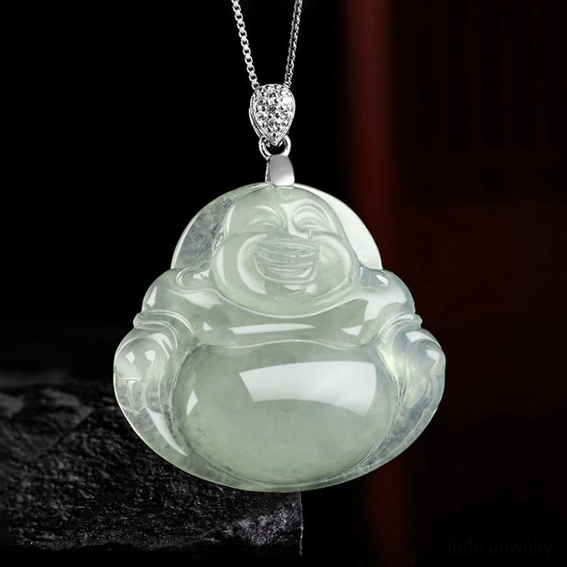 Light green jade laughing Buddha charm on titanium steel chain, frontal perspective showing smooth carved details