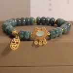 Natural jade lock charm bracelet with gold-toned fortune pendant in premium gift box