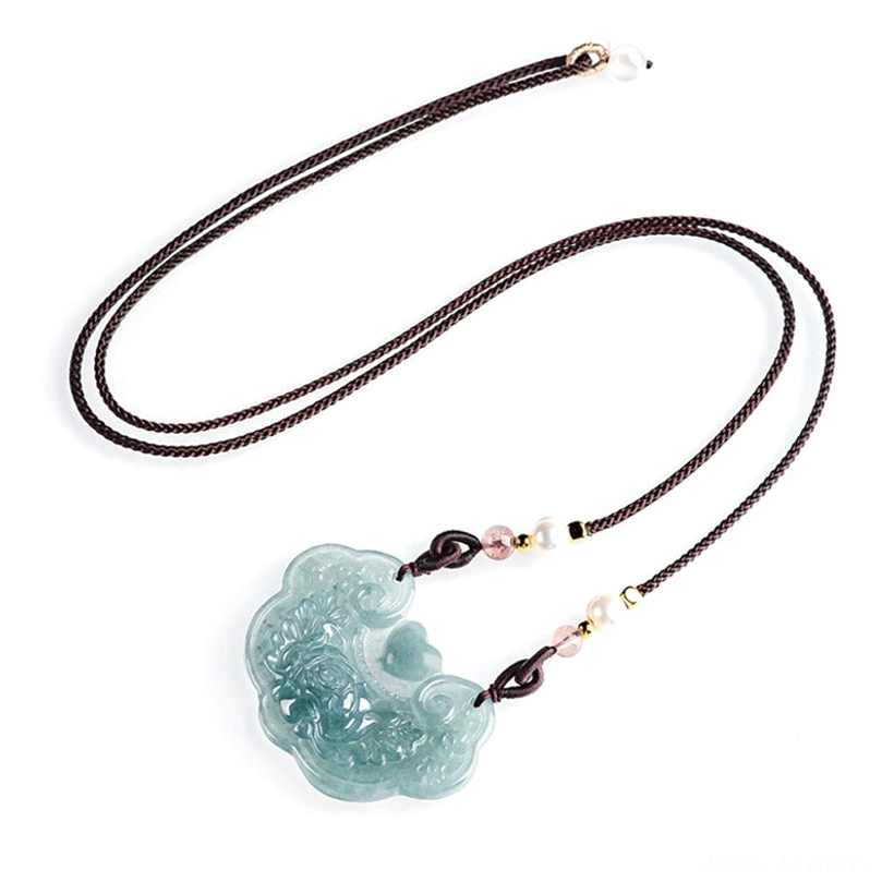 Jade lock pendant with ruyi motif carving representing good wishes and protection, traditional Chinese prosperity talisman jewelry