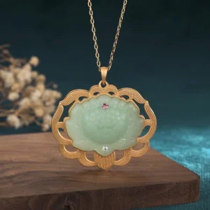 Natural jade lotus pendant necklace with gold-plated copper frame and gemstone accents, front view hanging close-up