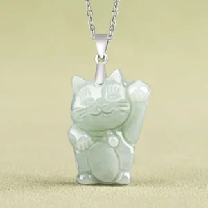 Light green jade lucky cat necklace pendant front view with silver chain and waving prosperity cat design