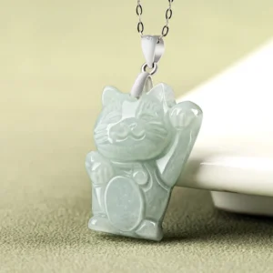 Jade fortune cat pendant side profile showing 3D carved lucky cat silhouette with silver bail