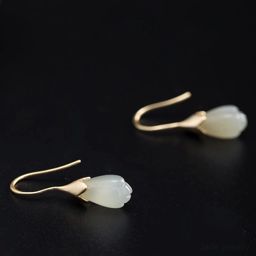 sterling silver jade magnolia drop earrings overhead side angle separate display