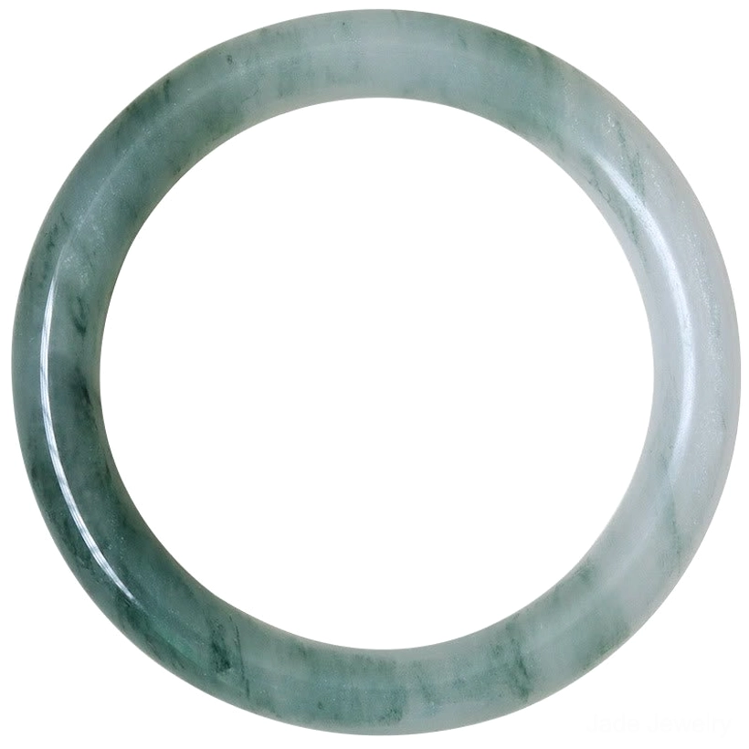 Natural jade material close-up showing authentic pale celadon base with dark green veining and polished surface quality