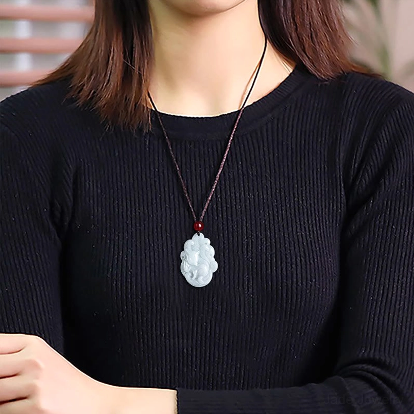 Nine-tailed fox jade pendant worn on neck close-up showing how to wear necklace daily