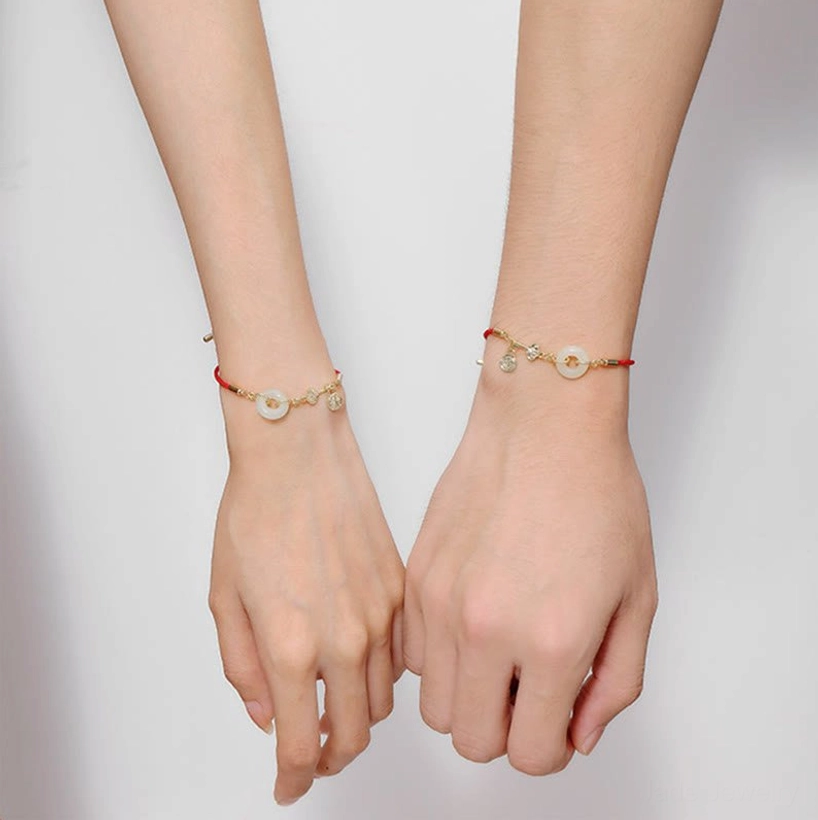 White jade bracelet symbolizing peace, tranquility and inner harmony on elegant neutral background
