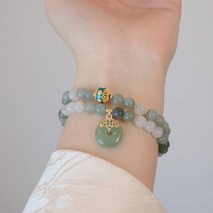 Jade peace buckle bracelet close-up showing authentic natural color variations and jade texture