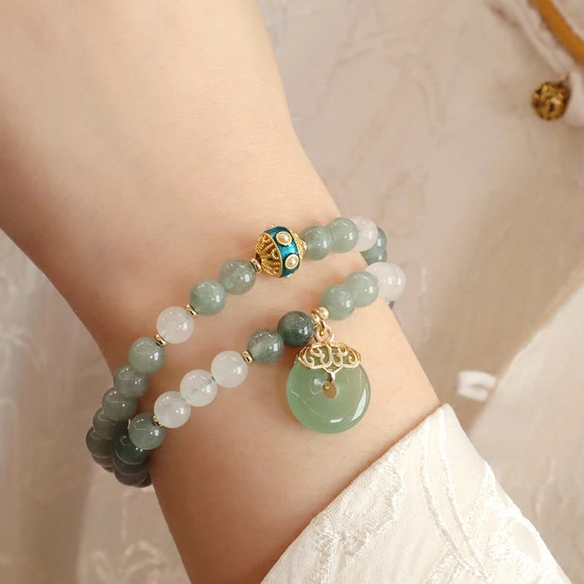 Jade bracelet with peace buckle styling shot demonstrating versatile everyday wear