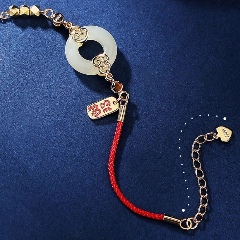 Extended view of jade peace buckle bracelet showing full chain layout, adjustable extender, and size proportions