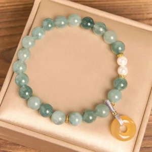 Jade peace buckle bracelet with silver clasp knot in luxury gift box packaging, showing mixed green jade beads and white pearl accents