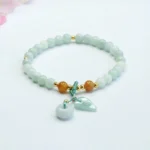 Green jade peace buckle prosperity bracelet with leaf charm, 6mm jade beads with gold accents