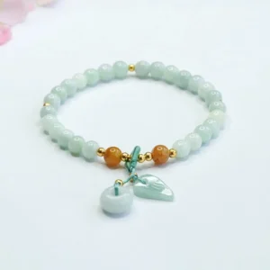 Green jade peace buckle prosperity bracelet with leaf charm, 6mm jade beads with gold accents