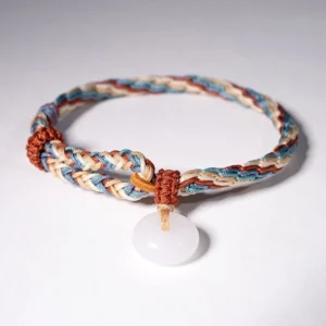 Premium hetian jade peace buckle charm with thick woven multicolor protection cord and brown decorative knots