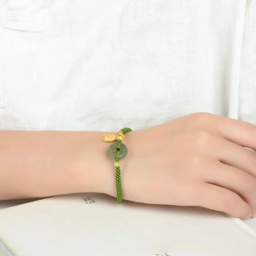 Worn on wrist green jade peace buckle bracelet showing fit and comfort