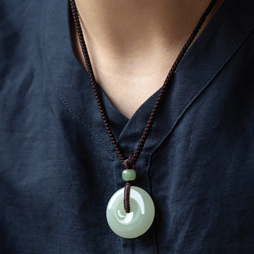 Authentic jade peace buckle necklace handmade craftsmanship detail showing natural color variations and authentic character